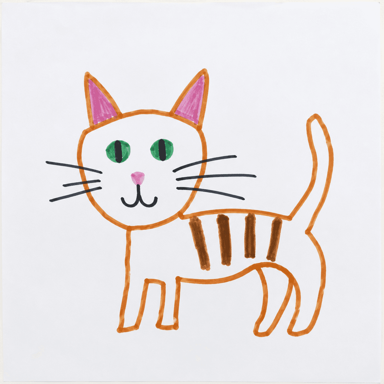 A photo of a child's marker drawing of a cat, photographed flat on white paper with bright even light